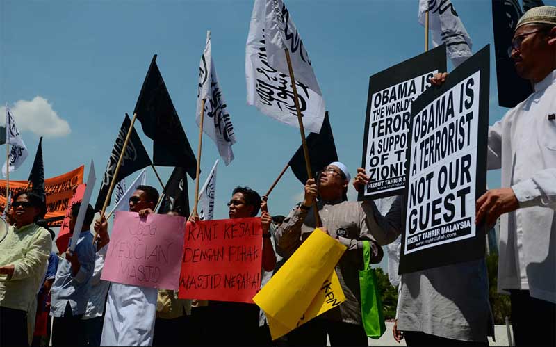 حزب التحرير في ماليزيا ينظم تظاهرة احتجاجا على زيارة أوباما